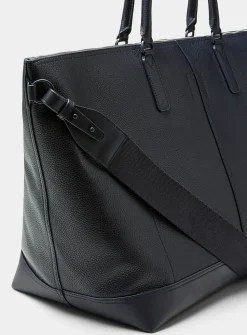Asymmetric pocket travel bag