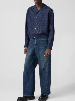 Beaded lyrics curved-seam jean