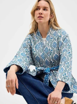 Belted reversible quilted jacket