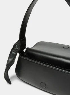 Buckled leather baguette bag