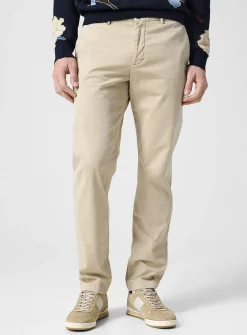 Cream-coloured tapered chino pant