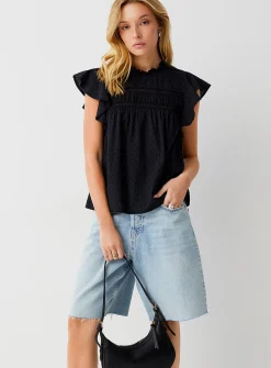 Crochet and Swiss dot ruffled collar blouse
