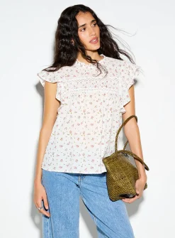 Crochet and Swiss dot ruffled collar blouse