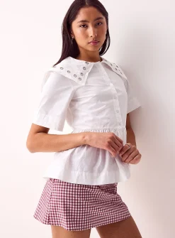 Cyrus peplum-waist blouse