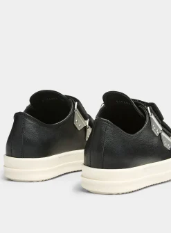 Double-strap low-top leather sneakers