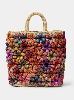 Embossed flower straw tote bag