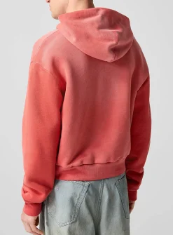 Faded red zip-up hooded sweatshirt
