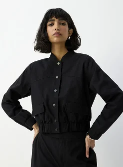 Flap pockets cropped linen-blend jacket