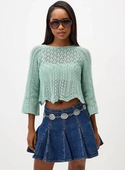 Flared-sleeve crocheted cropped sweater