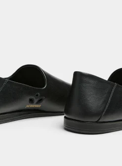 Foldable black leather flats