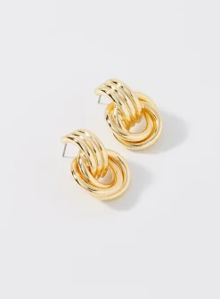 Golden interlocked hoop-style earrings