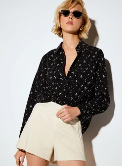 Jewel-button printed fluid blouse