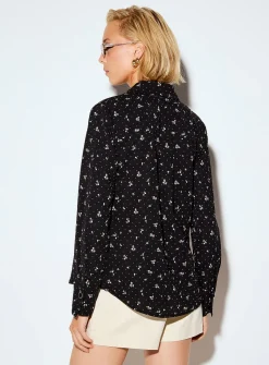 Jewel-button printed fluid blouse