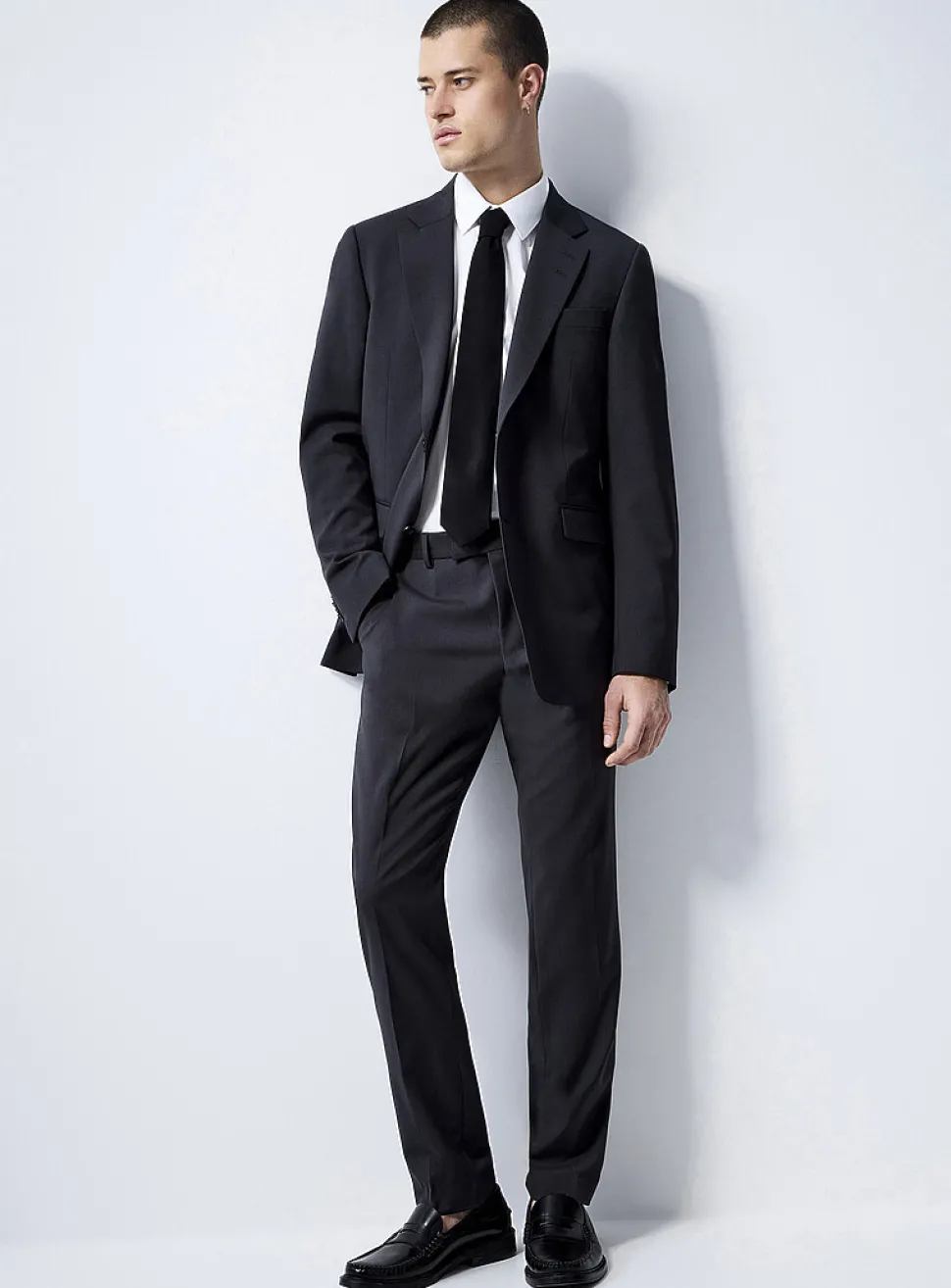 Justin Tenuta dark slate suit