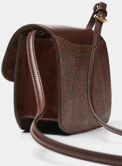 Leather and paisley canvas crossbody bag