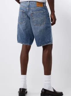Loose medium-blue jean short