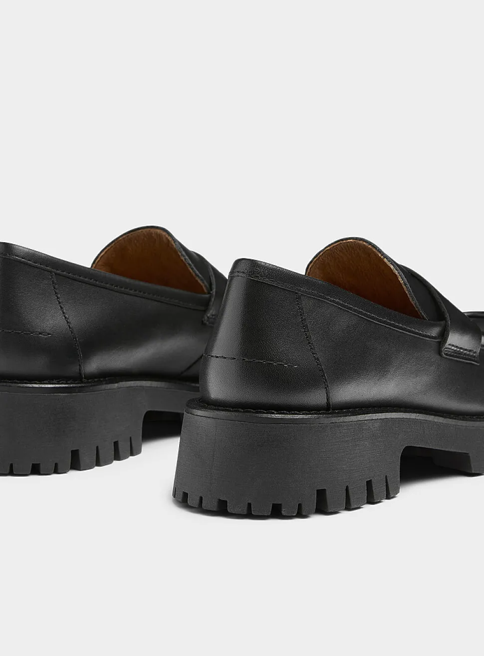 Lug-sole platform penny loafers
