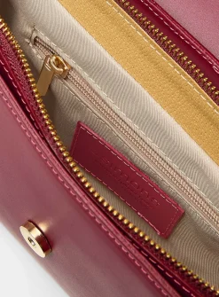 Metal buckle leather saddle bag