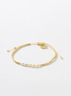 Mini-bead and pearl cord bracelet