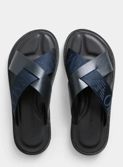 Navy blue leather crossed-strap sandals