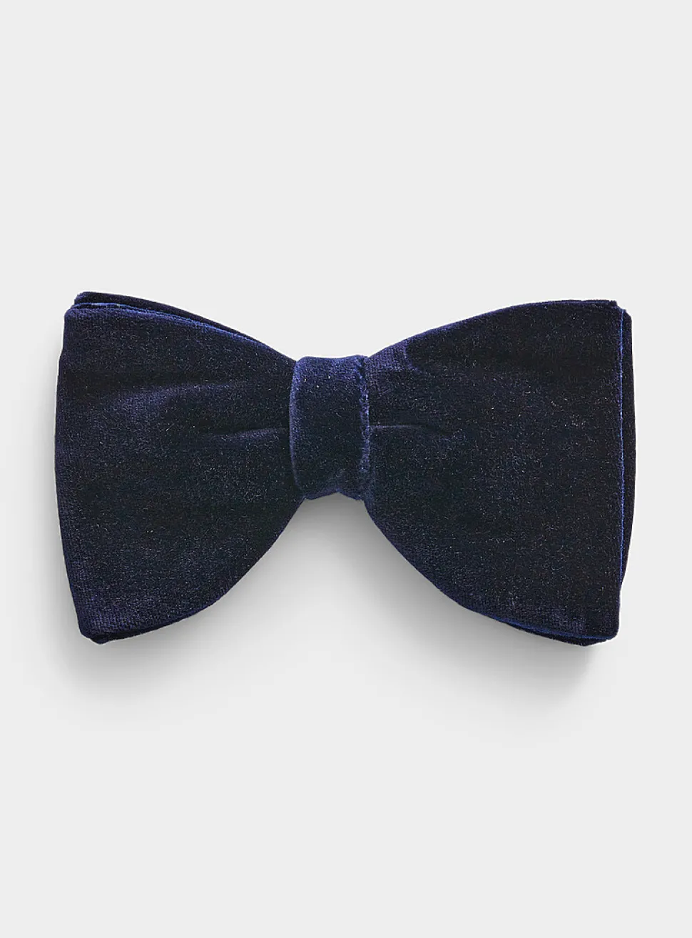 Oversized rich velvet bow tie
