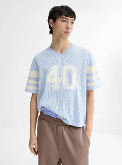 Perforated knit team sweater