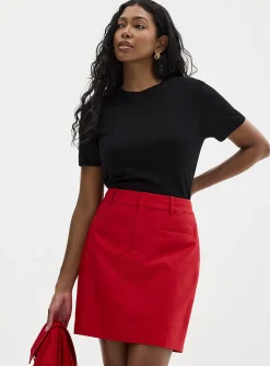 Piped pockets structured skort