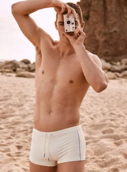 Piped retro fitted swim trunk