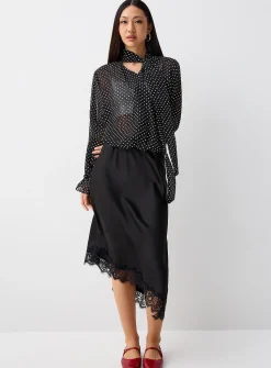Polka-dotted scarf-neck chiffon blouse