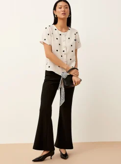 Polka-dotted short-sleeve crew-neck blouse
