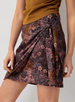 Printed side-tie wrap miniskirt