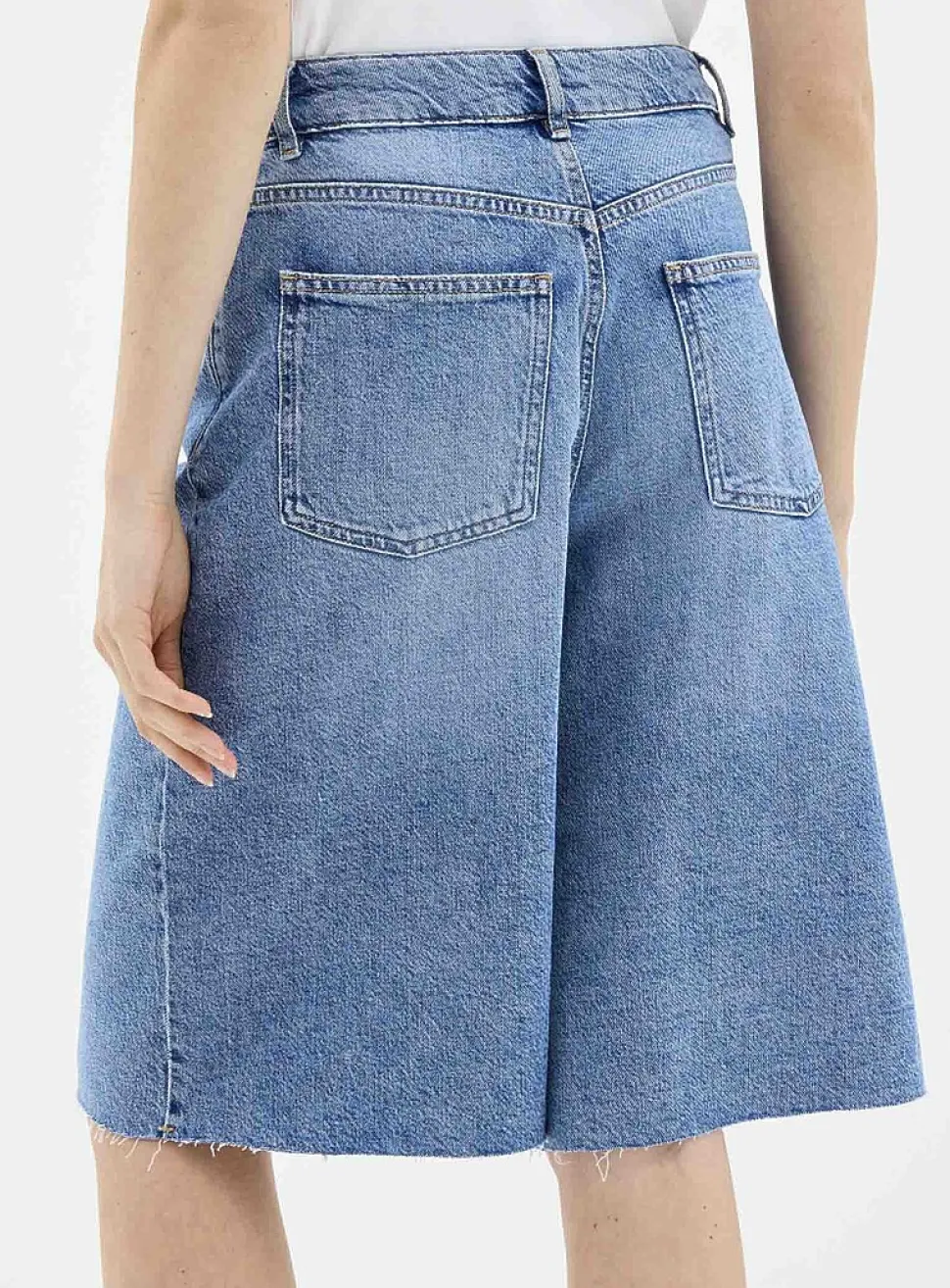 Raw-hem luxurious denim Bermudas