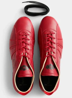 545 red sneakers