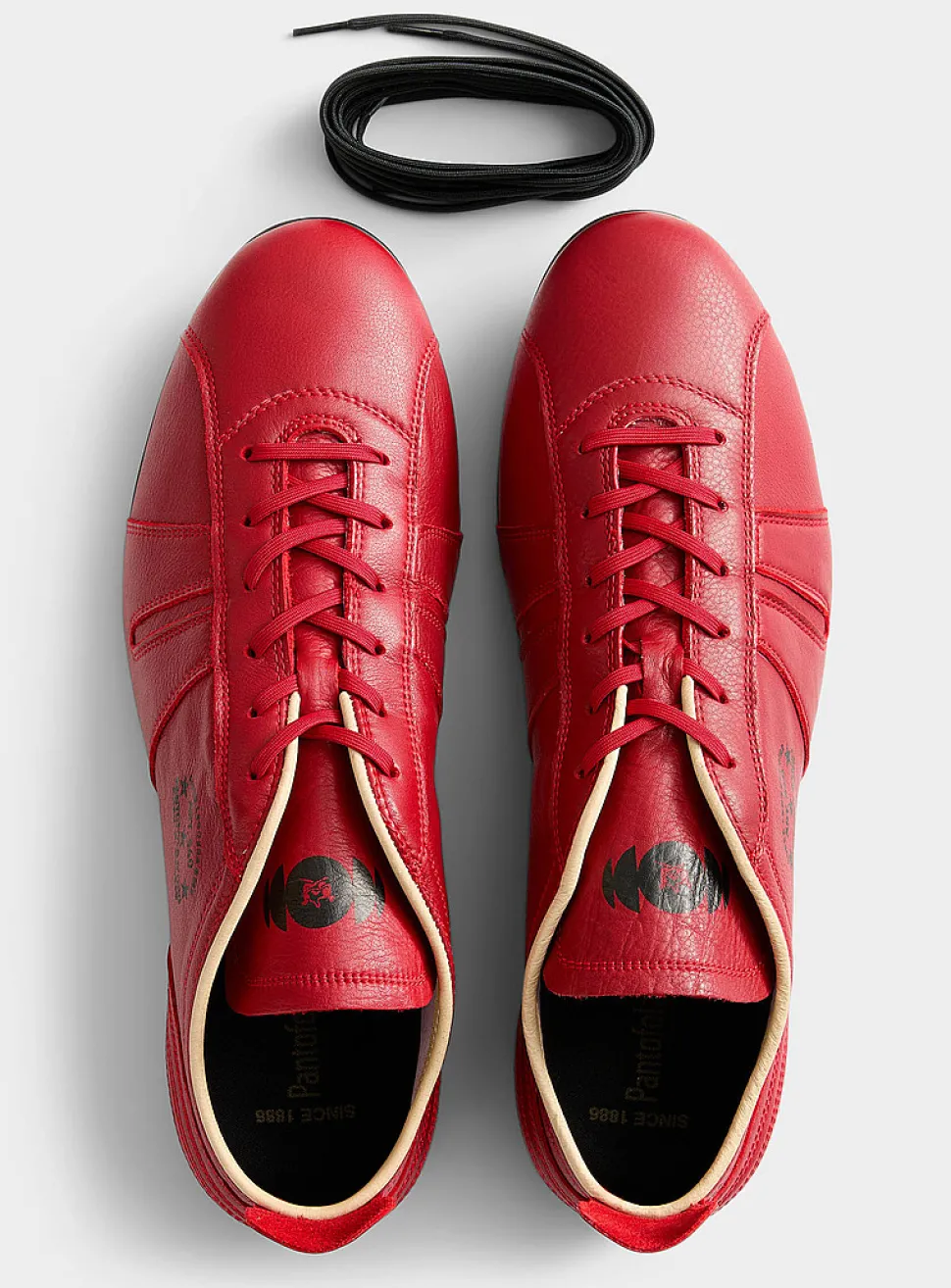 545 red sneakers