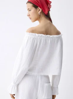 Ruffled off-the-shoulder blouse