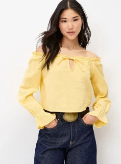 Ruffled off-the-shoulder blouse