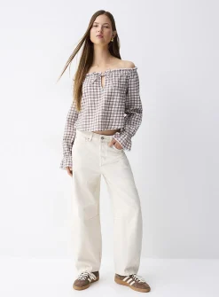 Ruffled off-the-shoulder blouse