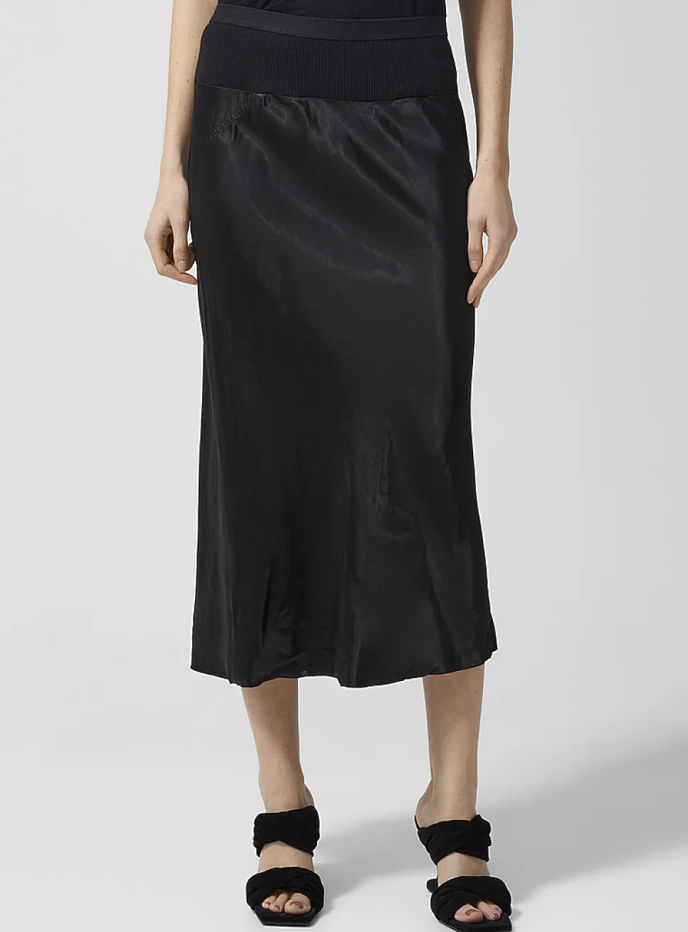 Satiny black pencil skirt
