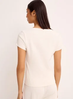 Scalloped edging pointelle knit cardigan