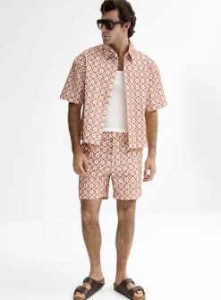 Simple flower embossed jacquard short