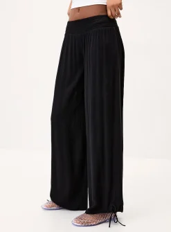 Smocked-waist crinkled-finish pant