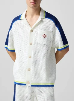 Striped trim crocheted knit shirt