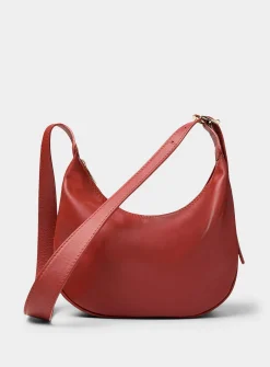 Textured-leather half-moon crossbody bag