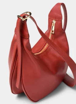 Textured-leather half-moon crossbody bag