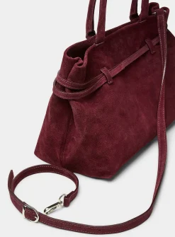 Thin-belt suede bag