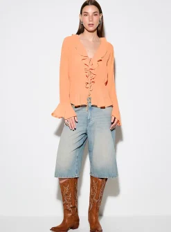 Tie-front and ruffled-edge sheer chiffon blouse