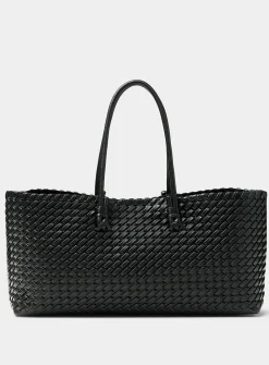 Tubular handle braided baguette bag