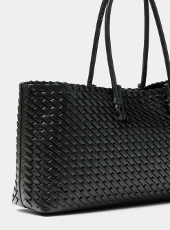 Tubular handle braided baguette bag