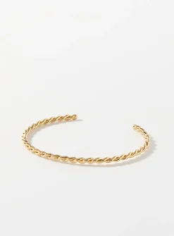 Twisted openwork golden bracelet