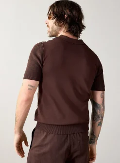 Vertical stripe knit polo